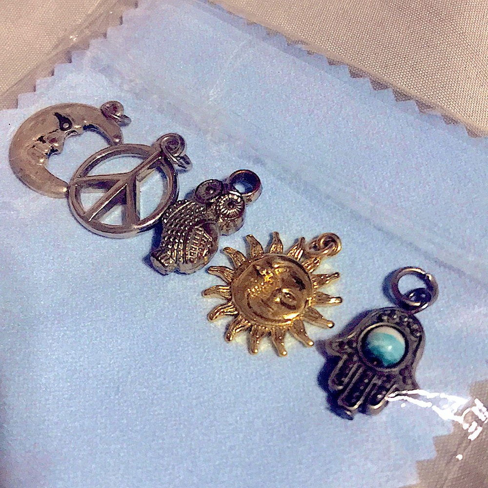 5 charms & 1 free belly ring.